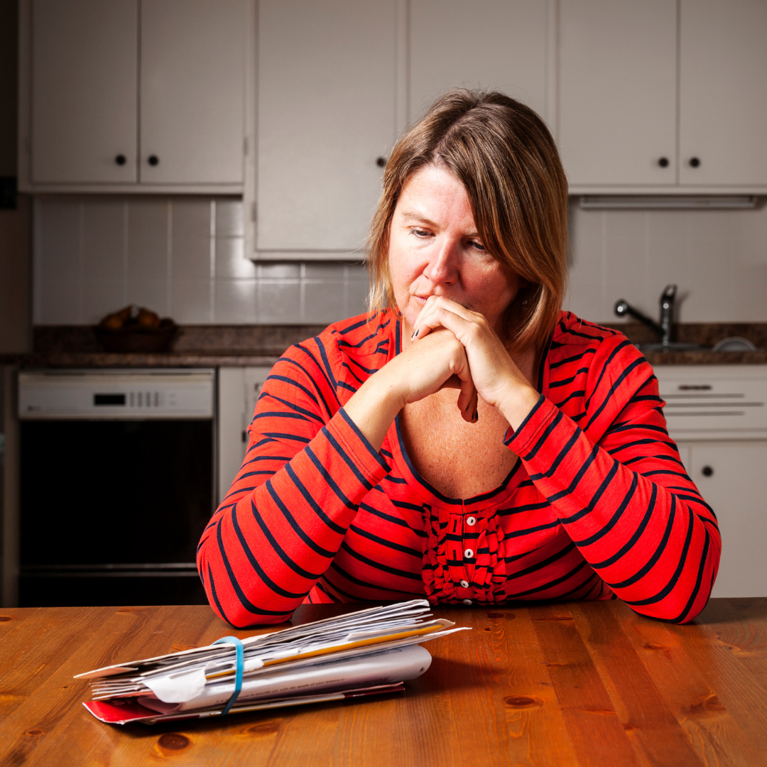 woman worried about money and bills